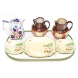 Two Royal Doulton brown stoneware jugs,