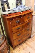 Victorian mahogany bow front chest of two short above three long drawers on turned legs, 124.