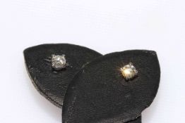 Pair of 18 carat gold and diamond stud earrings