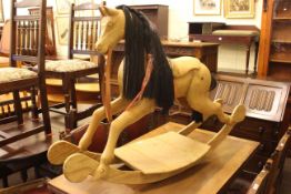 Carved and jointed wood rocking horse