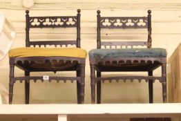 Pair of ebonised Victorian Gothic style nursing chairs