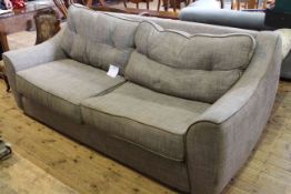 Collins & Brown large three seater sofa in grey fabric with brown leather piping