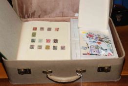 Suitcase containing various stamps and albums
