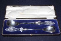 Cased silver and crystal salad servers,