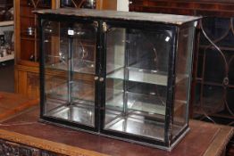 Table top double door display cabinet with mirrored floor