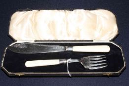 Cased silver fish servers,