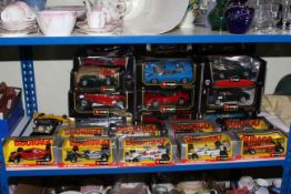 Quantity of boxed Burago model vehicles