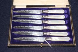 Cased mother of pearl handled tea knives