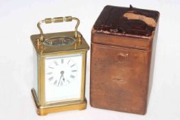 Gilt brass carriage clock with travel case