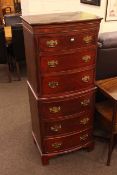 Mahogany chest of six drawers in the form of a chest on chest raised on bracket feet