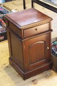 Pair of mahogany bedside cabinets each having a single drawer above cupboard base