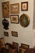 Group of pictures together with a carved crest and a mirror