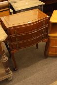 Oriental hardwood serpentine front three drawer chest on cabriole legs