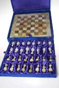 Cased onyx chess set with board