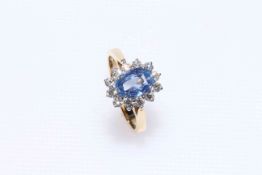 18 carat yellow gold, unheated sapphire and diamond cluster ring,