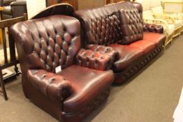 Thomas Lloyd ox blood leather three seater settee,