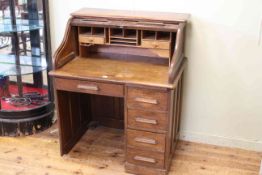 Oak single pedestal roll top desk with fitted interior