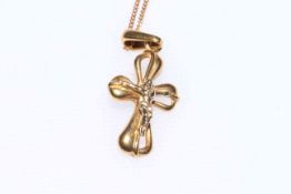 18 carat gold cross pendant on 9 carat chain