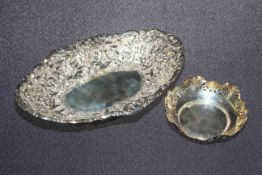 Victorian silver embossed oval dish, London 1889, and silver pierced bon bon dish,