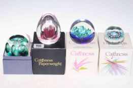 Four Caithness paperweights with boxes