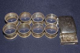 Eight silver napkin rings,