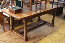Large rectangular oak refectory dining table in turned legs with understretchers,