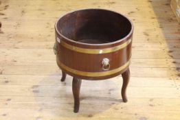 Mahogany brass bound wine cooler on shaped legs