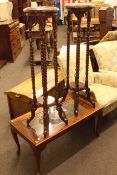 Eastern brass inlaid and carved top coffee table and pair of mahogany finish twist leg plant stands