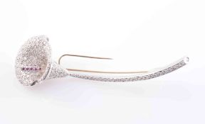 A CONTEMPORARY DIAMOND AND RUBY SET BROOCH, modelled as a calla lily,