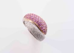 A DIAMOND AND PINK TOPAZ RING,