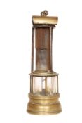 A 19th CENTURY BRASS MINER'S LAMP BY JOSEPH COOKE OF BIRMINGHAM, with screw off reservoir,