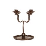 A CONTINENTAL WROUGHT-METAL FOUR BRANCH CANDELABRUM, c.