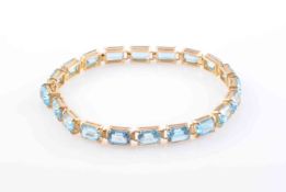 A BLUE TOPAZ BRACELET,