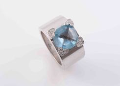 AN AQUAMARINE AND DIAMOND RING BY CHOPARD,