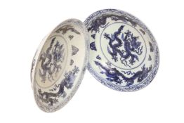 A NEAR PAIR OF CHINESE BLUE AND WHITE PORCELAIN DISHES, circular,