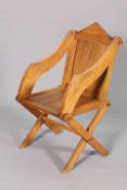 A LATE 19TH CENTURY OAK GLASTONBURY CHAIR, of characteristic form.