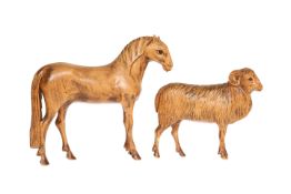 TWO HAND-CARVED WOODEN ANIMAL MODELS, c. 1930, a horse and a ram, each with glass eyes.