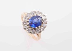 A SAPPHIRE AND DIAMOND RING,