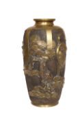 A JAPANESE BRONZE VASE, cast in relief with a crane standing beside foliage, seal mark to base.