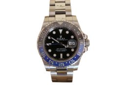A GENTLEMAN'S STAINLESS STEEL ROLEX GMT MASTER II OYSTER PERPETUAL SUPERLATIVE CHRONOMETER,