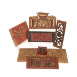 A COLLECTION OF CHINESE CARVED WOODEN PANELS.