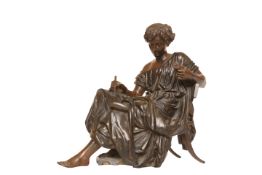 A FRENCH LATE 19th CENTURY BRONZE FIGURE, seated in a klismos chair and writing on a scroll,