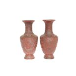 A PAIR OF CHINESE CINNABAR LACQUER VASES, 19th CENTURY, of baluster form,