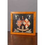 AN EMBROIDERED WOOLWORK FOR THE BORDER REGIMENT, in a maple frame. Overall 48.5cm by 54.