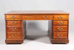 AN EDWARDIAN OAK PARTNERS DESK,