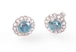 A PAIR OF BLUE ZIRCON AND DIAMOND EARRINGS,