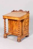 A VICTORIAN BURR WALNUT DAVENPORT, with fretwork gallery and tooled leather inset hinged slope,