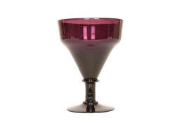 AN AMETHYST GLASS RUMMER, with shaped funnel bowl, knopped stem and circular foot.