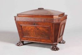 A HANDSOME REGENCY MAHOGANY CELLARETTE, of sarcophagus form, raised on paw feet.