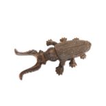 A CAST-IRON BOOT JACK, c. 1900, cast as a horned beetle.